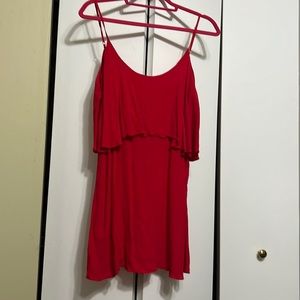 Light flowy red blouse with one layer just over the chest area